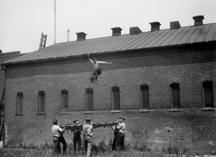 Fireman Jumping from Building Rooftop, Firemen's School, Washington DC, USA, Harris & Ewing, 1921
