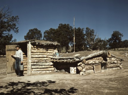 Mr. Leatherman, Homesteader, Coming out of his Dugout Home, Pie Town, New Mexico, USA, Russell Lee for Farm Security Administration - Office of War Information, September 1940