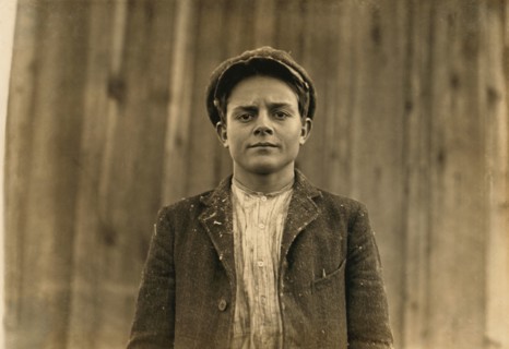 Young Textile Mill Worker, Half-Length Portrait, Dillon, South Carolina, USA, Lewis Hine for National Child Labor Committee, December 1908