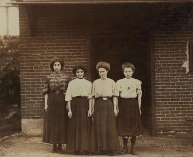 Portrait of Four Young Female Workers at Hand Silk Mill, Wilmington, Delaware, USA, Lewis Hine for National Child Labor Committee, May 1910