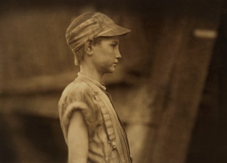 Young Doffer, Half-Length Profile, Avondale Mills, Birmingham, Alabama, USA, Lewis Hine for National Child Labor Committee, November 1910