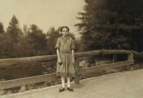 Rosina Goyette, 12 years old, but said she is 14, Full-Length Portrait, Works as Doffer and Spinner at Spring Village Mills, Winchendon, Massachusetts, USA. Lewis Hine for National Child Labor Committ...