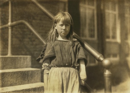 Pearl, 10 years old, Half-Length Portrait, Helps her Mother in Weave Room at Pickett Cotton Mill, High Point, North Carolina, USA, Lewis Hine for National Child Labor Committee, October 1912