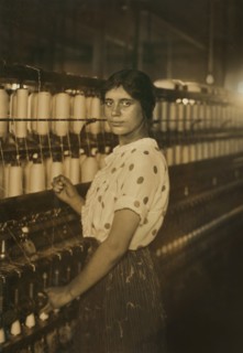 Young Spinner in Textile Mill, Fall River, Massachusetts, USA, Lewis Hine for National Child Labor Committee, June 1916