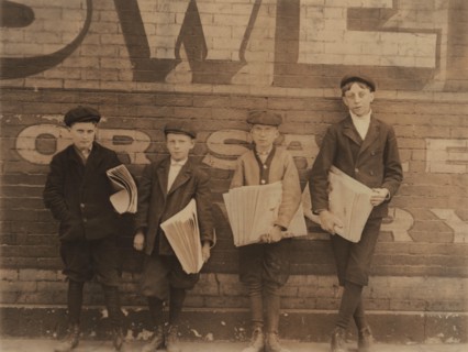 Four Truant Newsboys Selling Newspapers during School, Jefferson Street near Washington, St. Louis, Missouri, USA, Lewis Hine for National Child Labor Committee, May 1910