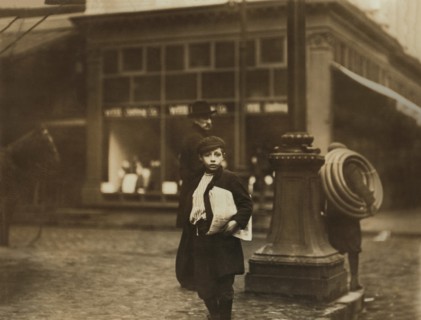 Young Newsboy on Street Corner at Night, Olive & 6th Street, St. Louis, Missouri, USA, Lewis Hine for National Child Labor Committee, May 1910
