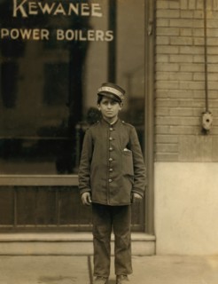 Small Messenger Boy, Portrait Standing on Sidewalk, St. Louis, Missouri, USA, Lewis Hine for National Child Labor Committee, May 1910