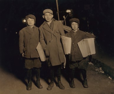 Three Young Boys Selling "Warheit" Jewish Newspapers at Midnight, Full-Length Portrait, Delancey Street, New York City, New York, USA, Lewis Hine for National Child Labor Committee, March 1913