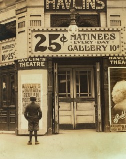 Young Boy Outside, Motion Picture Theater, St. Louis, Missouri, USA, Lewis Hine for National Child Labor Committee, May 1910