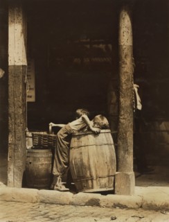 Two Young Brothers Picking Discarded Fruit out of Barrels near 14th Street, New York City, New York, USA, Lewis Hine for National Child Labor Committee, July 1910