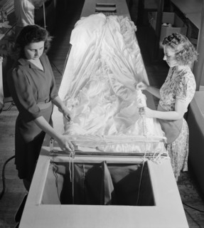 Two Female Workers Threading Shroud Cords through Parachute Fabric, Pioneer Parachute Company, Manchester, Connecticut, USA, William M. Rittase for Office of War Information, August 1942