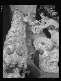 Three Workers Carefully Inspecting Power Section Crank Cases for Airplane Engines at Manufacturing Plant, Pratt & Whitney, East Hartford, Connecticut, USA, Andreas Feininger for Office of War Informat...