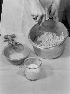 Woman Mashing Cooked Beans while Making Baked Bean Loaf, a Nourishing and Healthy Meat Substitute, Ann Rosener for Office of War Information, October 1942