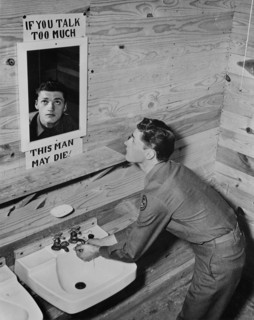 Soldier Looking in Bathroom Mirror with a Reminder to Practice Discretion, "If You Talk Too Much This Man May Die", Camp Hood, Texas, USA, Office of War Information, January 1943