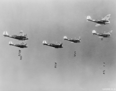 600-pound Bombs falling from Formation of B-10 Bombers in Bombing Practice by 19th Bombardment Group, U.S. Army Air Corps, Office of War Information, early 1940's