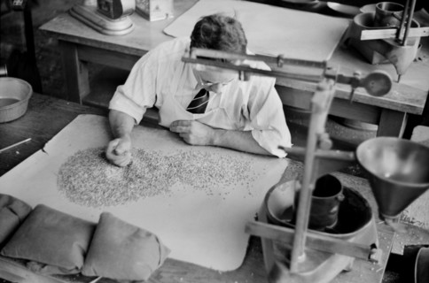 Worker Testing for Impurities in Wheat at Grain Inspection Department, Minneapolis, Minnesota, USA, John Vachon for Farm Security Administration, September 1939