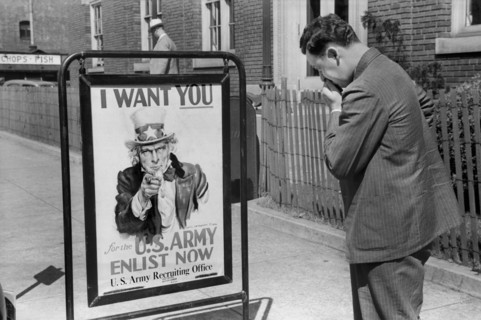 Man Looking at U.S. Army Recruitment Sign, Benton Harbor, Michigan, USA, John Vachon for Farm Security Administration July 1940