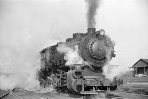 Locomotive in Railway Yard along River, St. Louis, Missouri, USA, Arthur Rothstein for Farm Security Administration, January 1939