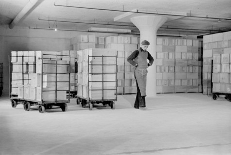 Worker Storing Crates of Eggs in Cold Storage Warehouse, Jersey City, New Jersey, USA, Arthur Rothstein for Farm Security Administration, January 1939