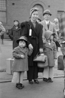Japanese-American Mother and Daughter Waiting for Train to Owens Valley During Evacuation of Japanese-Americans from West Coast Areas under U.S. Army War Emergency Order, Los Angeles, California, USA,...