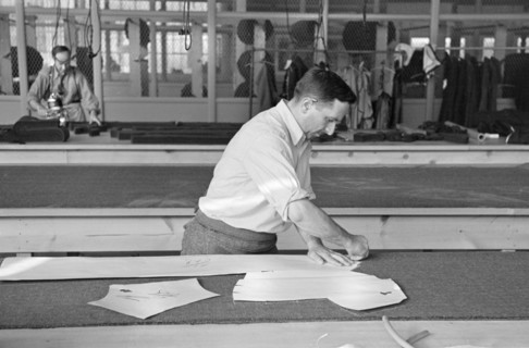 Luis Gushen, Chief Cutter in Cooperative Garment Factory at Jersey Homesteads, Marking out Pattern of Woman's Coat, which will be made in the Factory, Hightstown, New Jersey, USA, Russell Lee, U.S. Re...