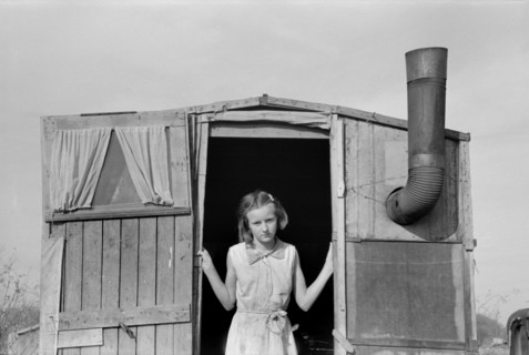 Daughter of Migrant Farmer in Doorway of Trailer, Sebastin, Texas, USA, Russell Lee, Farm Security Administration, February 1939