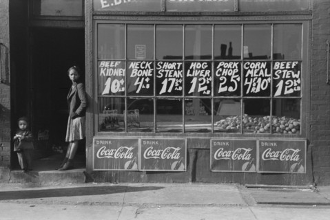 Two Children Standing in Doorway of Grocery Store, South Side, Chicago, Illinois, USA, Russell Lee, Farm Security Administration, April 1941