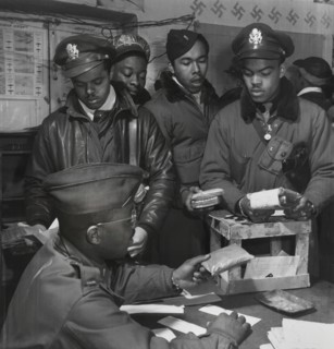 Cyanide "Escape Kits" Being Distributed to Fighter Pilots at Air Base, Seated: Theodore G. Lumpkin, Jr., Standing (left to right): Joseph L. "Joe" Chineworth, Memphis, TN, Class 44-E; Robert C. Robins...