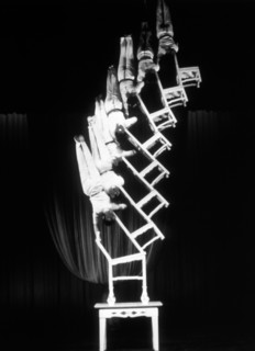 Seven Women of the Chongqing Acrobatic Company Balanced on Stacked Chairs
