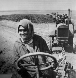 Woman Driving Tractor on Collective Farm, Soviet Union, 1928