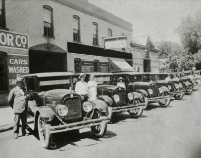 People Posed With Row of Automobiles, USA, 1921