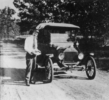 Man Standing Next to Ford Model T Car, circa 1918