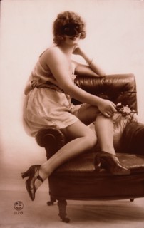 French Lingerie Model Wearing Mask, circa 1920