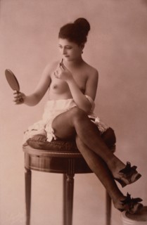 Partially Nude French Lingerie Model with Mirror and Lipstick, 1920