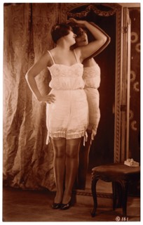 French Lingerie Model Leaning Against Mirror, circa 1920