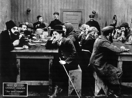 Charlie Chaplin and Group of Unidentified Actors on-set of the Film, The Immigrant, 1917