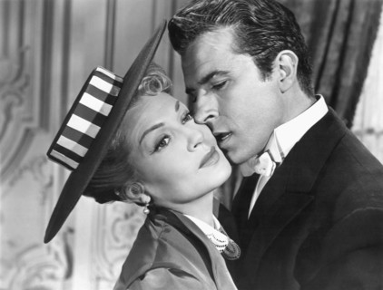 Lana Turner and Fernando Lamas on-set of the Film, The Merry Widow, 1952