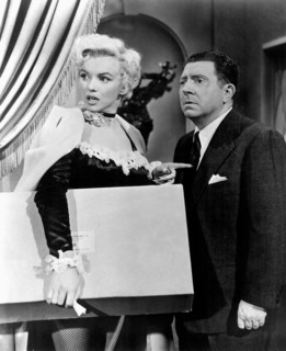 Marilyn Monroe and Frank McHugh on-set of the Film, "There's No Business Like Show Business", 1954, TM and Copyright (c) 20th Century-Fox Film Corp. All Rights Reserved