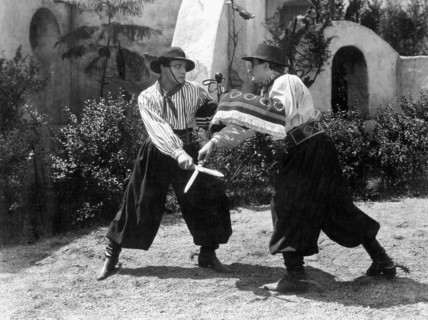 Rudolph Valentino (left), on-set of the Film, "Blood and Sand", directed by Fred Niblo, 1922