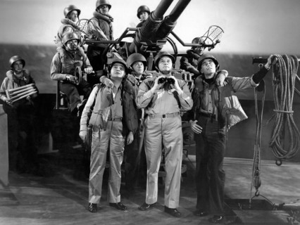 Edward G. Robinson, (left), Glenn Ford, (right), on-set of the Film, "Destroyer", 1943