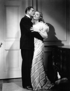 Warner Baxter, Myrna Loy, on-set of the Film, "Broadway Bill", 1934