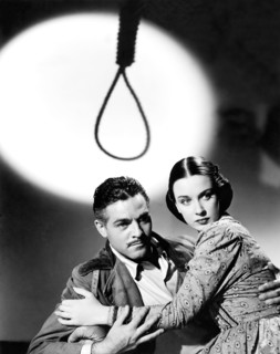 Alan Curtis, Patricia Morison, on-set of the Film, "Hitler's Madman", 1943