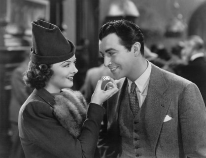 Myrna Loy, Robert Taylor, on-set of the Film, "Lucky Night", 1939