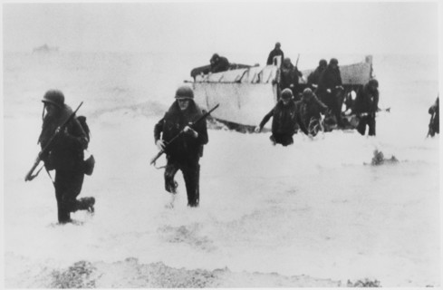 WWII U.S. Soldiers Disembarking Landing Craft on Beach, from the Documentary Film Series, "Why We Fight", Episode "War Comes to America", 1945