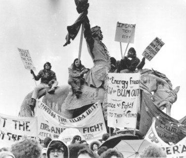 Protesters on Statue Outside Hilton Hotel Where President Richard Nixon was Speaking, Chicago, Illinois, USA, 1974