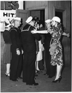 Showgirl Betty Douglas Doubling as Air Raid Warden during WWII, New York City, USA, 1943