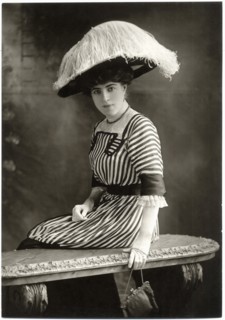 Fashionable Woman, Seated, in Striped Dress and Large Ostrich Hat, Chicago, Illinois, USA, circa 1915