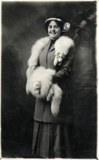 Smiling Woman Wearing Fox Fur Stole and Hand Muff, Portrait, circa 1918