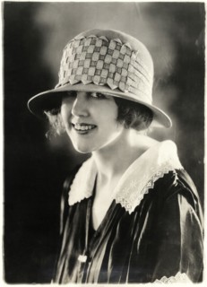 Smiling Woman in Sports Hat of Felt and Straw Braid, Close-Up Portrait, circa 1922