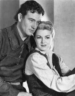John Wayne, Claire Trevor, on-set of the Film "Allegheny Uprising", 1939